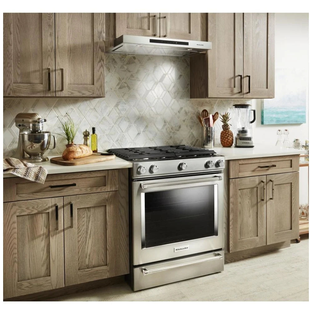 KitchenAid 30" 5-Burner Gas Slide-In Range with Even-Heat™ True Convection, Stainless Steel, Installed in a Modern Kitchen.